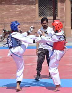 Female Players in action during Faisalabad Division Inter Club Taekwondo Championship 2026 organised by Faisalabad Division Taekwondo Association at Crescent Sports Complex.