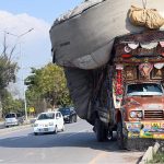 A truck overloaded with husk veered off the road near Rawal Dam Chowk in the Federal Capital, creating a potential traffic hazard