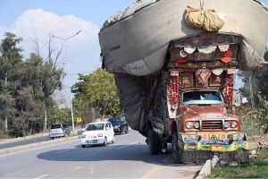 A truck overloaded with husk veered off the road near Rawal Dam Chowk in the Federal Capital, creating a potential traffic hazard