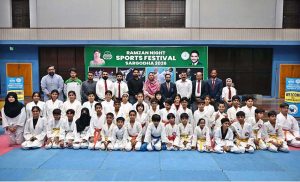 Karate Players lock in fierce combat during the Karate Championship organized by the Sports Department Sargodha as part of the Ramazan Night Sports Festival at the Sports Gymnasium, held on the instructions of Deputy Commissioner Hussain Ahmed Raza.