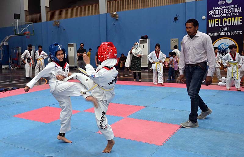 Players in action during the Taekwondo Championship organized by the Sports Department Sargodha as part of the Ramadan Night Sports Festival at the Sports Gymnasium on the instructions of Deputy Commissioner Hussain Ahmed Raza