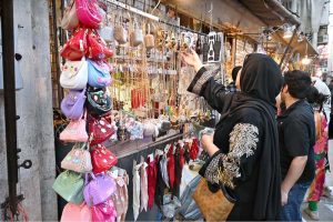 Women are busy selecting and purchasing artificial jewelry for preparation of Eidul Fitr at G-9 Market