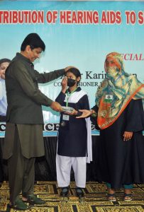 Commissioner Multan Division Mr. Aamir Kareem Khan distributing hearing aids among students under the “Sound for Students” initiative at Government Secondary School of Special Education.