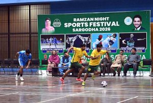 Players in action during the Futsal Championship organized by the Sports Department Sargodha as part of the Ramadan Night Sports Festival on the instructions of Deputy Commissioner Hussain Ahmed Raza at the Sports Gymnasium