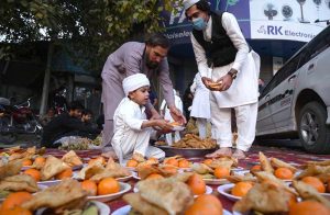A view of an iftar dastarkhwan arranged to provide free iftar meals to fasting and deserving people during the holy month of Ramazan at Khyber Bazar Chowk.
