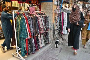 Women are busy selecting and purchasing artificial jewelry for preparation of Eidul Fitr at G-9 Market
