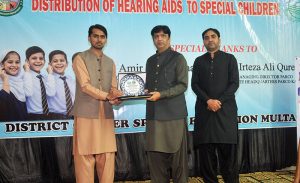 Commissioner Multan Division Mr. Aamir Kareem Khan distributing hearing aids among students under the “Sound for Students” initiative at Government Secondary School of Special Education.