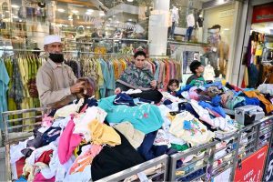 Women are busy selecting and purchasing artificial jewelry for preparation of Eidul Fitr at G-9 Market