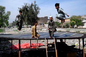 Children enjoying jump on trampoline during Eid holidays at Ring Road area.
