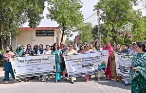Vice Chancellor GCWUF Prof. Dr. Kanwal Ameen leads an awareness walk organized by the Department of Botany in collaboration with the Green & Clean Society at the university campus