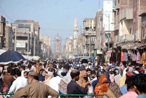 A large number of people busy in shopping at Jhang Bazaar ahead of Eidul Fitr