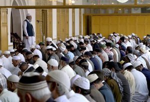 A large number of faithful offer Friday prayers during holy fasting month of Ramazan at Eidgah Masjid.