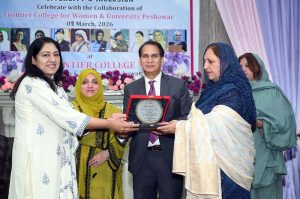 Chairman Hum Log Augustin Jacob poses in a group photo with officials and participants during International Women’s Day at Government Frontier College for Women