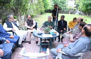 Defence Minister Khawaja Muhammad Asif listens to public concerns at his residence.
