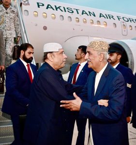 President Asif Ali Zardari is being received by Senior PPP leader and Member National Assembly, Syed Khurshid Ahmed Shah upon his arrival at Sukkur Airport