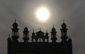 An attractive view of sunset behind a mosque in the federal capital.