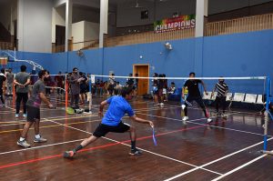 Players in action during the Badminton Championship organized by the Sports Department as part of the Ramadan Night Sports Festival at the Sports Gymnasium, under the guidance of Deputy Commissioner Hussain Ahmed Raza.