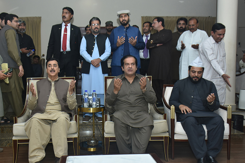 Chairman Senate Syed Yousaf Raza Gillani offers Fatiha for the departed soul of the mother of State Minister Abdul Rehman Kanju at Kanju farm Kahror Pakka