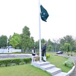 Mr. Saad Ahmad Warraich, Chargé d' Affaires of Pakistan to India hoisting the national flag at an impressive ceremony at Pakistan High Commission
