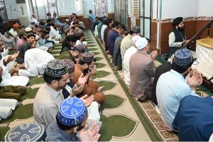 A large number of faithful raise their hands in Dua for peace, security and harmony in the country and around the world after the third Friday prayers of Ramadan at Jamia Masjid, Puran Nagar.