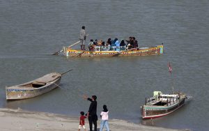 Children enjoying horse riding at AL-Manzar picnic point Indus river Jamshoro.