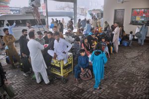 A large number of passengers waiting for bus to leave for their hometowns at the General Bus Stand to celebrate Eid ul Fitr festival with their loved ones