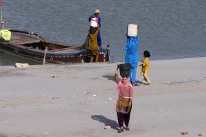 Children enjoying horse riding at AL-Manzar picnic point Indus river Jamshoro.