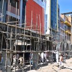 Labourers are busy in construction work of Model Bazaar at Raja Bazaar