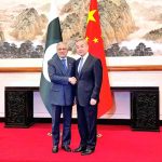 Deputy Prime Minister and Foreign Minister, Senator Mohammad Ishaq Dar, is received by Foreign Minister of China, Wang Yi at the Diaoytai State Guest House