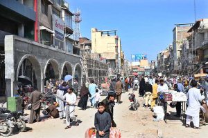Labourers are busy in construction work of Model Bazaar at Raja Bazaar