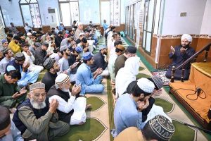 A religious scholar delivers a sermon on the last Friday of the holy month of Ramazan at the Jamia Masjid Ghussia Hanfia Purn Nagar
