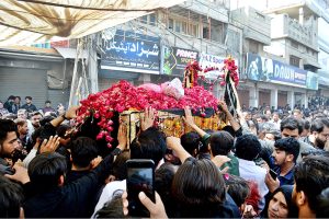 A large number of mourners attend a Majlis to commemorate the martyrdom anniversary of Imam Ali ibn Abi Talib (AS), the fourth Caliph of Islam and cousin of Muhammad (PBUH)