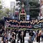 A large number of mourners attending the procession on Yom-e-Shahadat of Hazrat Ali (RA) at AL-Rahim Shopping center roads