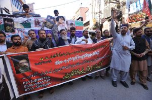Members of Tehreek e Azadi Quds holding a protest rally marking Al-Quds Day, in solidarity with the Palestinian people.