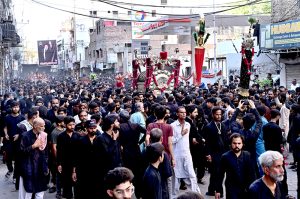 A large number of mourners attending the procession on Yom-e-Shahadat of Hazrat Ali (RA) at AL-Rahim Shopping center roads