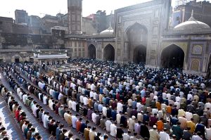 Muslim worshipers offer Friday prayers during the holy fasting month of Ramazan at historical Mosque Masjid Wazir Khan.