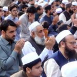 A large number of faithful offering dua after Eidul Fitr prayer at Eidgah