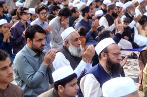 A large number of faithful offering dua after Eidul Fitr prayer at Eidgah