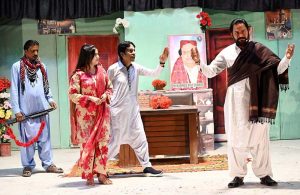 Artists perform in the drama "Koi Koi Aadmi Moti Ka Dana" in collaboration with the Sindh Culture Department at ZA Bhutto Open Air Theater, Arts Council.