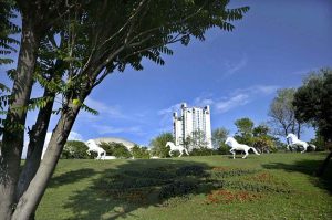 A motorcyclist crosses in front of the newly installed “I Love Islamabad” sculpture at the Convention Center, enhancing the beauty of the federal capital