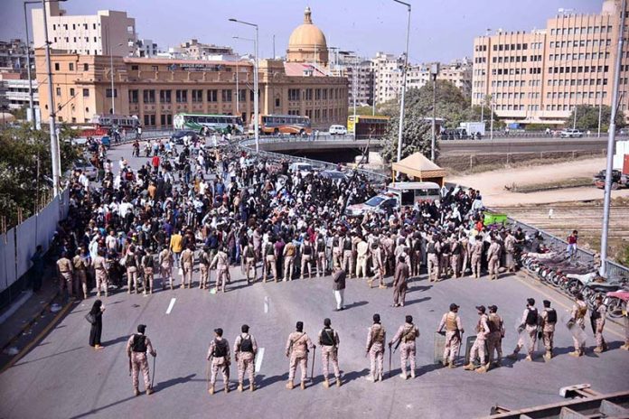 Security personnel manage to contain the protestors as they gather near U.S. Consulate, against attacks on Iran that led to martyrdom of Iranian Supreme Leader Ayatollah Seyyed Ali Khamenei