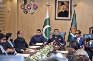 Balochistan Home Minister Zia Ullah Langau, Additional Chief Secretary (Home) Muhammad Hamza Shafqaat, and DIG Quetta brief media representatives during a press conference on security and governance measures.