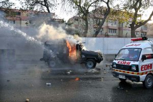 Security personnel manage to contain the protestors as they gather near U.S. Consulate, against attacks on Iran that led to martyrdom of Iranian Supreme Leader Ayatollah Seyyed Ali Khamenei