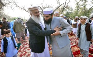 A large number of faithful offering dua after Eidul Fitr prayer at Eidgah