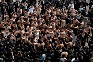 A large number of people participating in a procession marking the death anniversary of Imam Ali, cousin of Prophet Muhammad (PBUH)