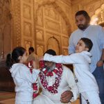 People receiving faithful who complete Itikaf at Badshahi Masjid on the last night of Ramazan