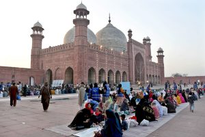 Muslim devotees break their fast with Iftar meals in the Islamic holy fasting month of Ramazan, at the historical Badshahi mosque in the Provincial Capital.