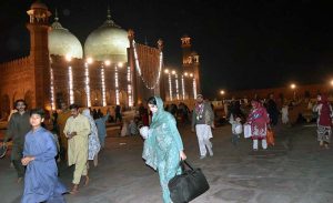 People receiving faithful who complete Itikaf at Badshahi Masjid on the last night of Ramazan