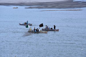 A large number of people enjoying Eid holidays with boat ridding at AL-Manzar point in River Indus