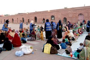 Muslim devotees break their fast with Iftar meals in the Islamic holy fasting month of Ramazan, at the historical Badshahi mosque in the Provincial Capital.